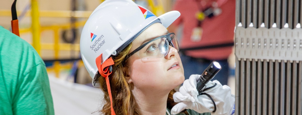 two people working in nuclear plant