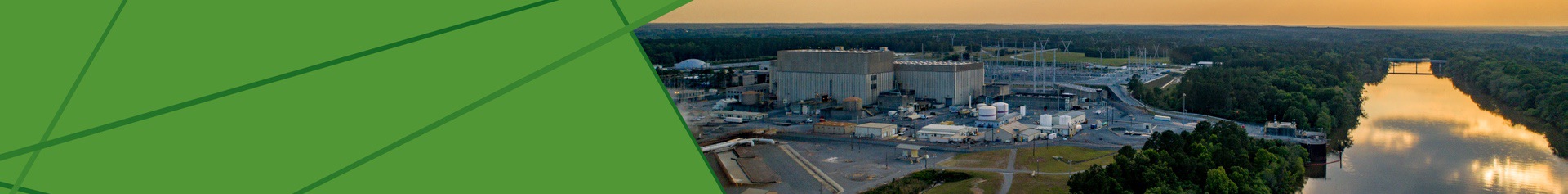 Panoramic image of Plant Hatch at sunset, showing the full facility and river access in Baxley, GA.