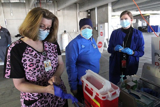 Nurses prepare for next patient